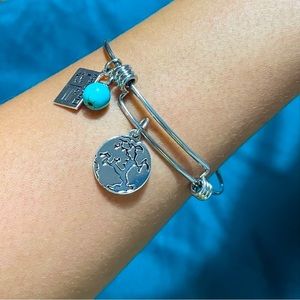 **( SOLD )** Silver-tone bracelet